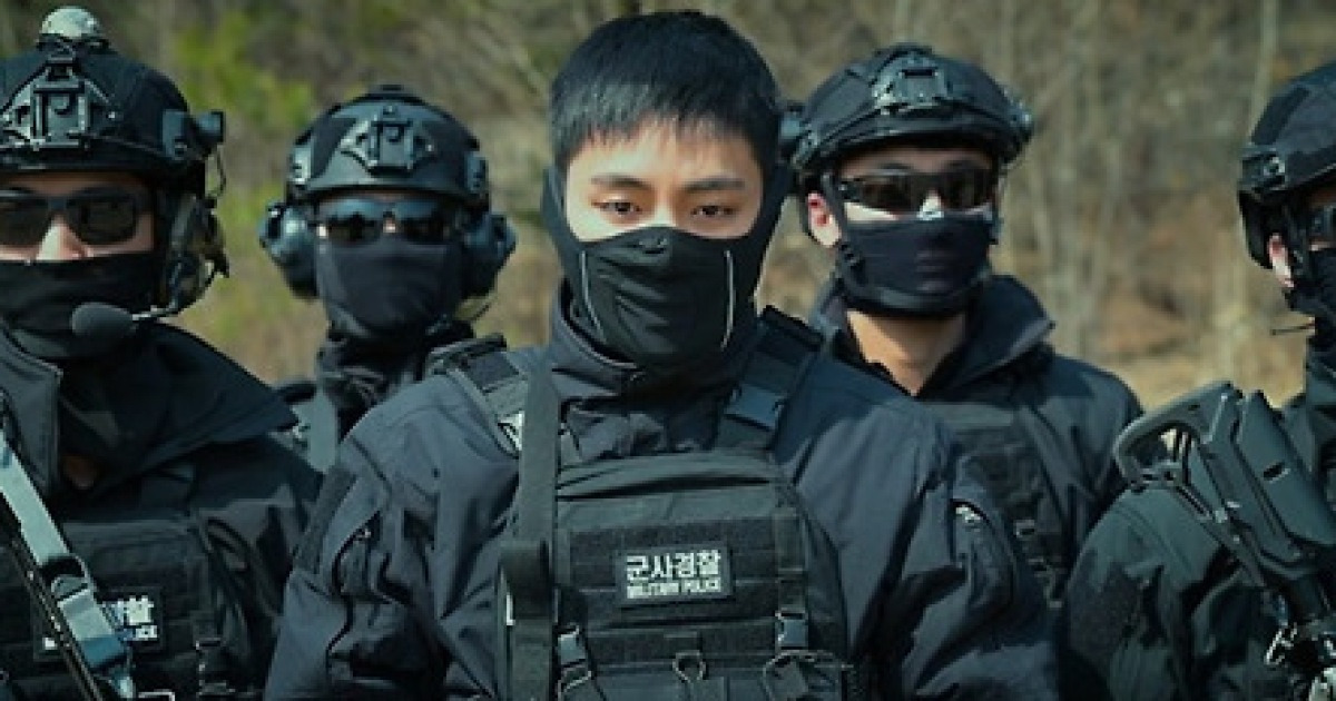 BTS V appears in military police combat uniform